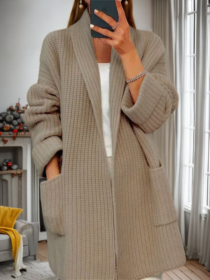 Women's longer oversized knitted coat with shawl collar and patch pockets Mune Fashion