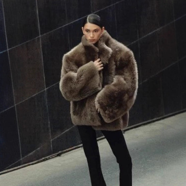 Women short coat made of luxurious faux fur with voluminous shawl collar and boxy silhouette Mune Fashion
