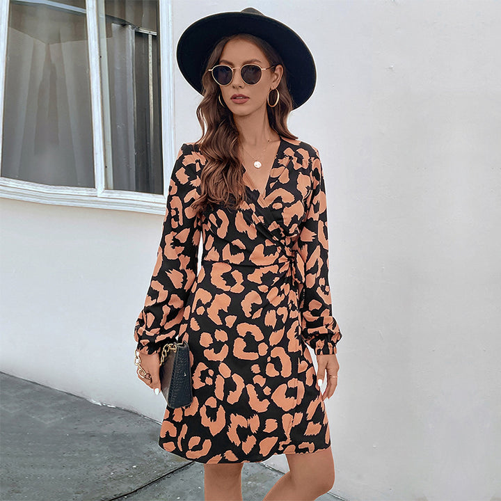 Women's wrap dress with fitted knot, V-neck, balloon sleeves and animal print Mune Fashion