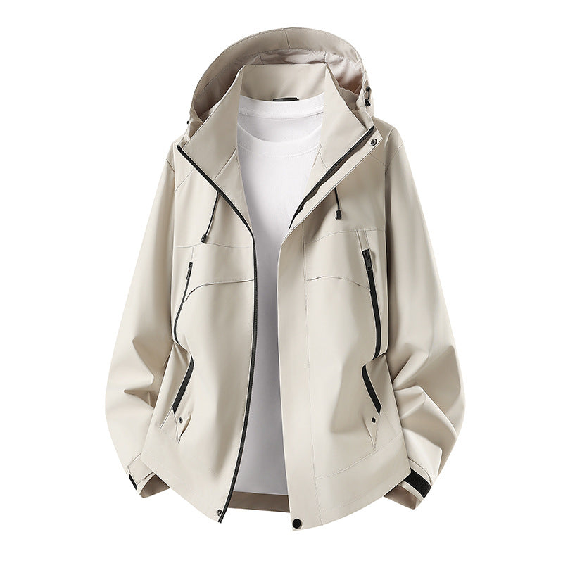 Women's lightweight waterproof hooded jacket with breathable coating, zippered pockets, and adjustable cuffs Mune Fashion