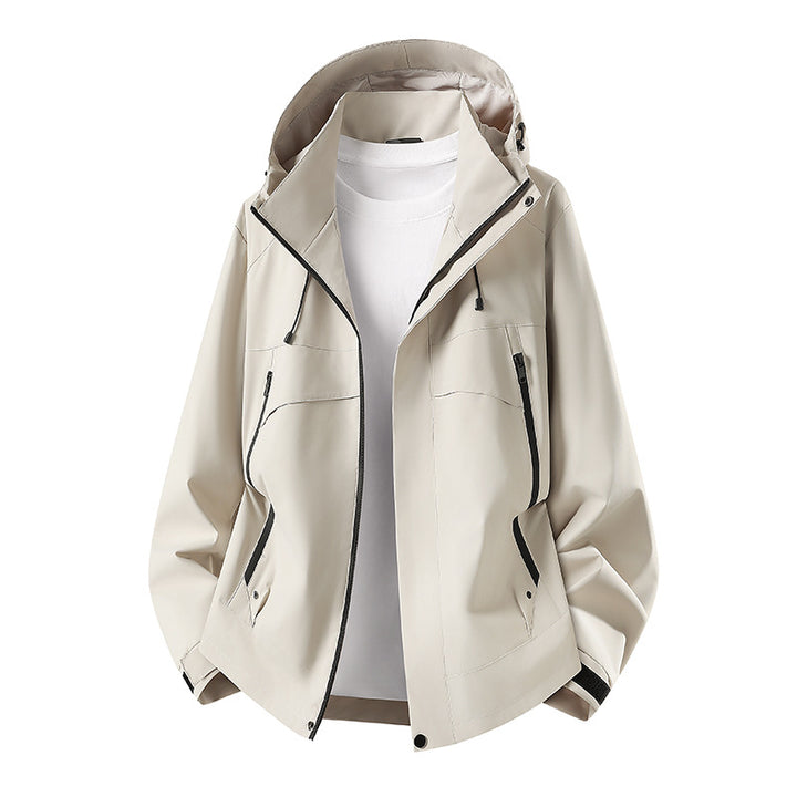 Women's lightweight waterproof hooded jacket with breathable coating, zippered pockets, and adjustable cuffs Mune Fashion