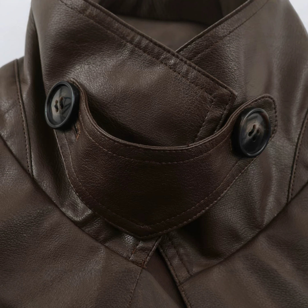 Women's tailored cropped faux leather jacket with tie belt and asymmetric button placket Mune Fashion