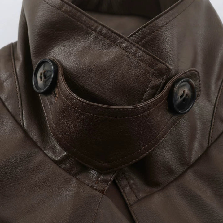 Women's tailored cropped faux leather jacket with tie belt and asymmetric button placket Mune Fashion