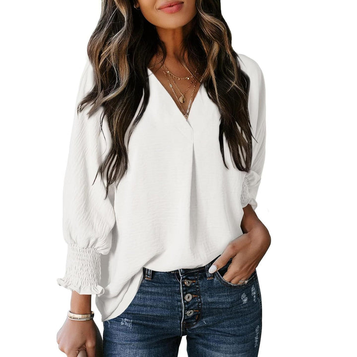 Women V-neck blouse with casual balloon sleeves and ruffle details Mune Fashion