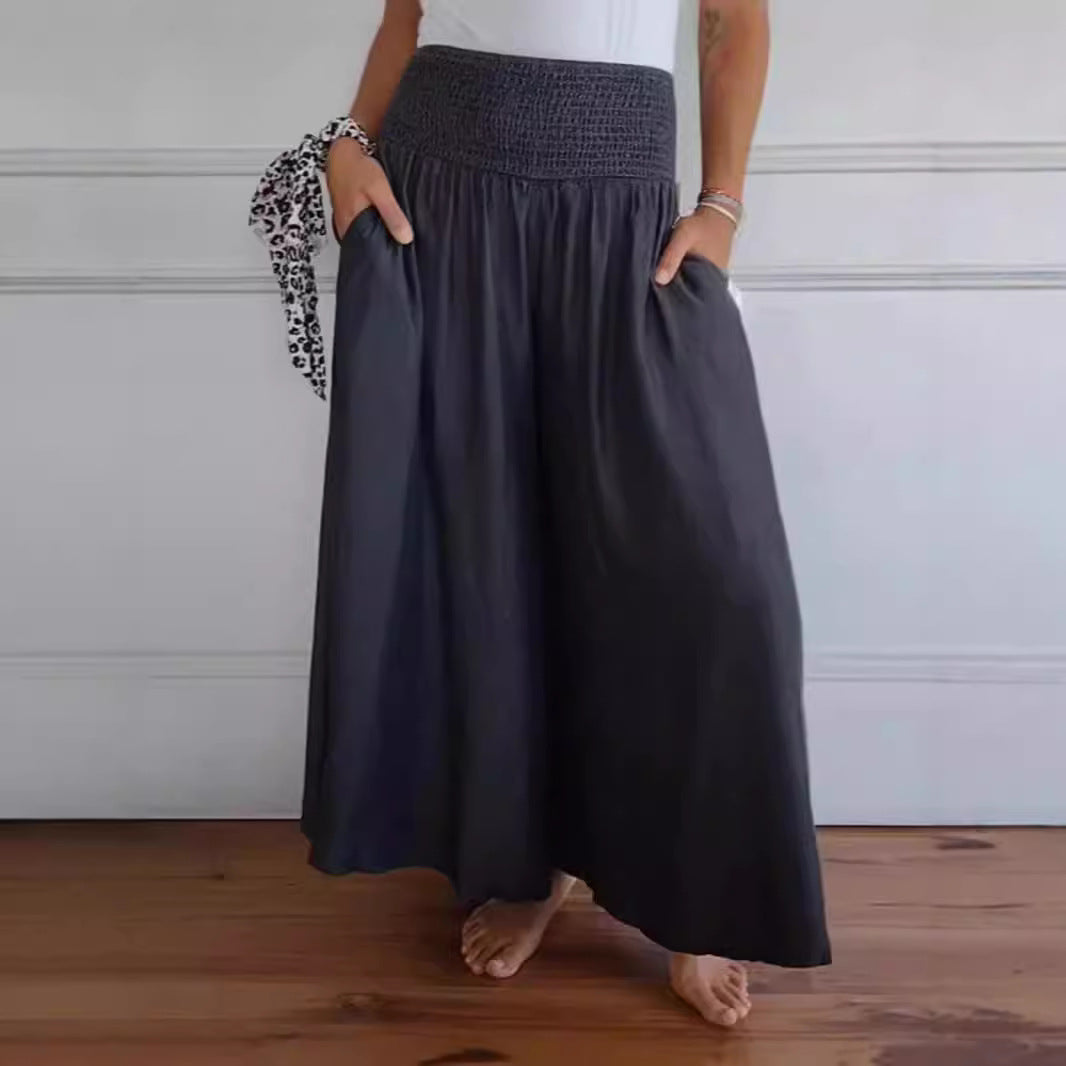 Women's maxi skirt with high smock waistband, wide fall and side pockets Mune Fashion