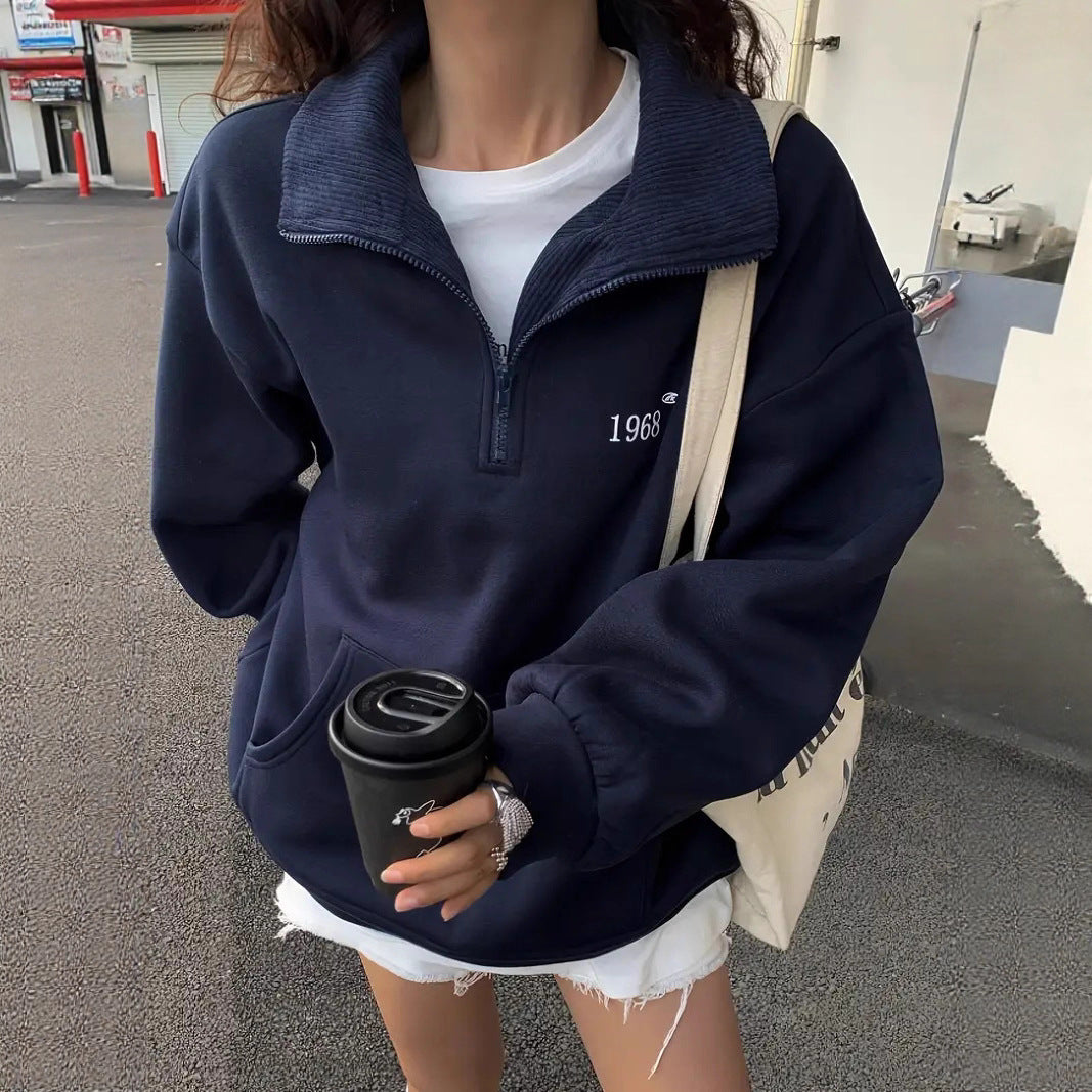 Women's oversized half-zip sweatshirt with high collar, kangaroo pocket, and casual oversized fit Mune Fashion