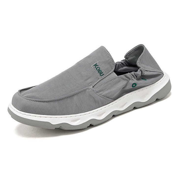 Men's elastic nubuck-look slipper with padded heel trim and shock-absorbing wave outsole Mune Fashion