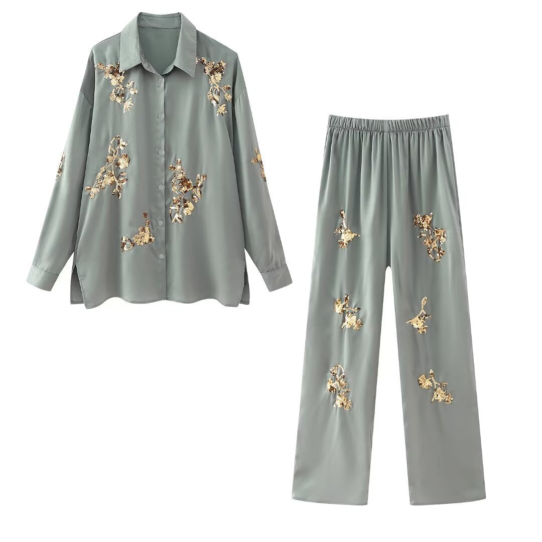 Women's wide satin pants with elastic waistband and golden sequin flowers Mune Fashion
