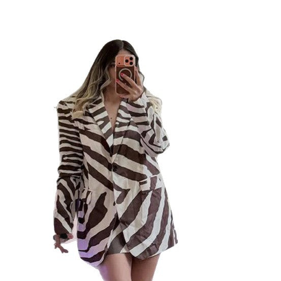 Women’s blazer dress in zebra print with prominent shoulder area & wide waist belt Mune Fashion