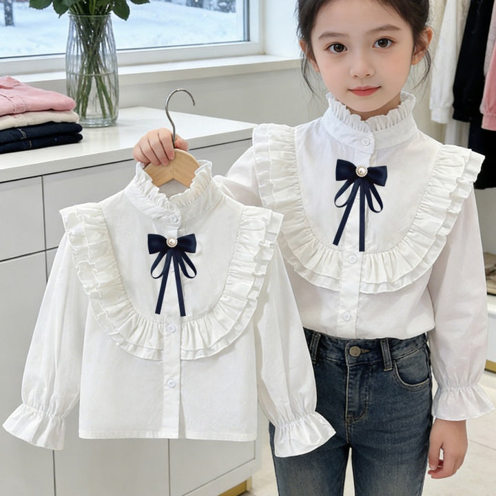 Girls elegant ruffle blouse with decorative bow closure Mune Fashion