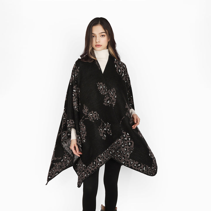 Women's wool look throw with woven leopard jacquard and open pointed edge Mune Fashion