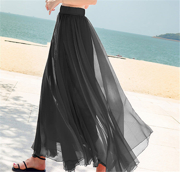 Women's flowing maxi skirt made of chiffon with elastic waistband and layered ruffle Mune Fashion