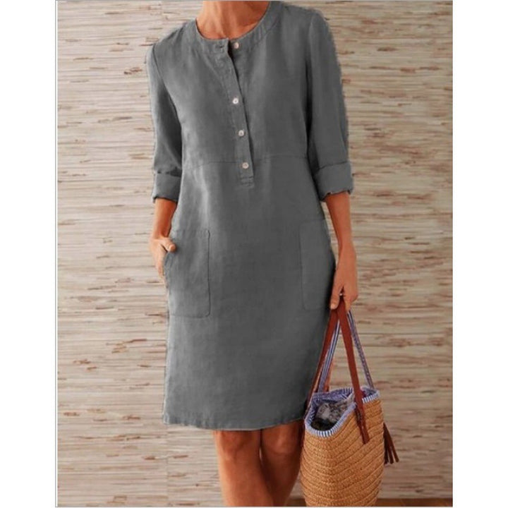 Women loose-fitting linen-look dress with three-quarter sleeves, button placket and side pockets Mune Fashion