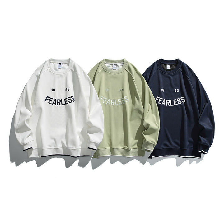 Unisex Oversize Sweatshirt with raglan sleeves and distinctive FEARLESS front print Mune Fashion