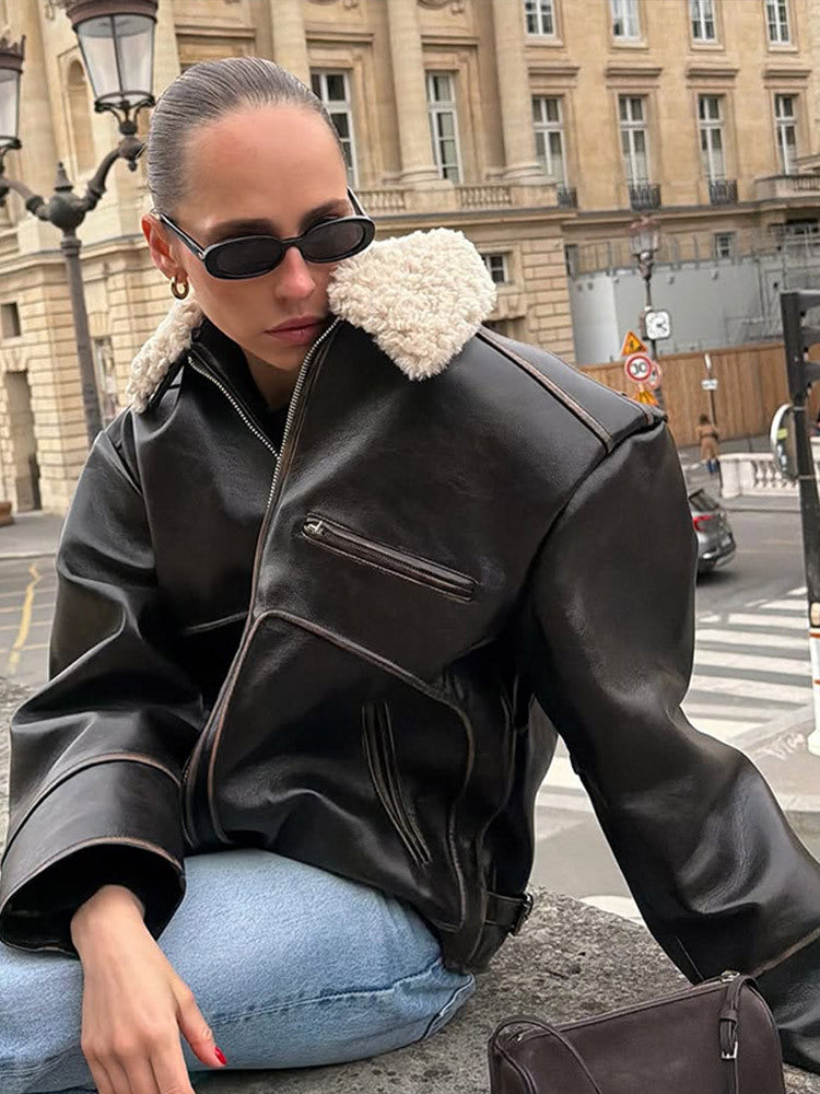 Women Short Cut Leather Imitation Bomber Jacket with Voluminous Teddy Shawl Collar and Distinctive Decorative Seams Mune Fashion