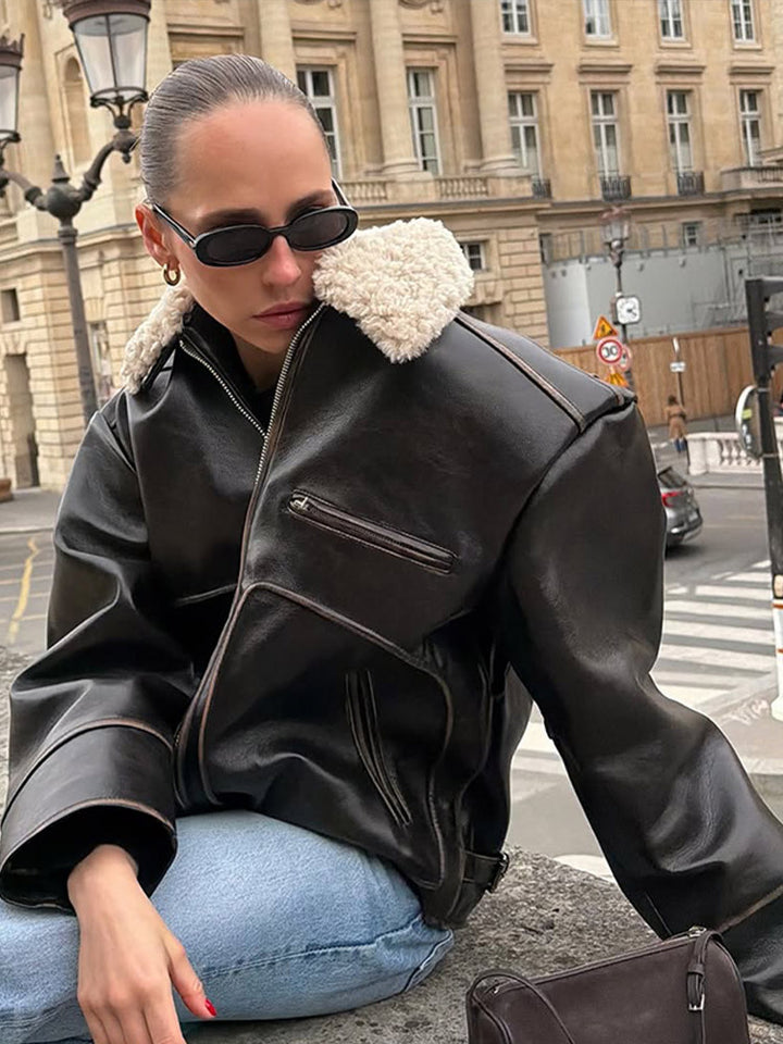 Women Short Cut Leather Imitation Bomber Jacket with Voluminous Teddy Shawl Collar and Distinctive Decorative Seams Mune Fashion