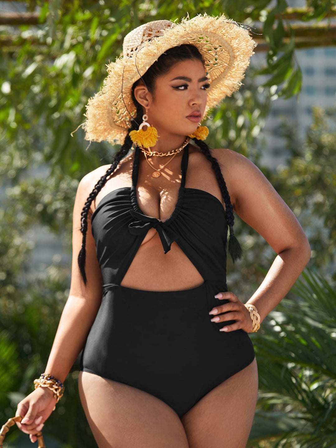 Women's one-piece swimsuit with playful knot and side cut-outs Mune Fashion