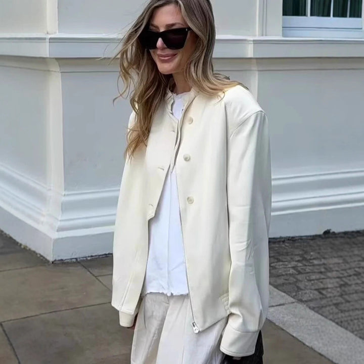 Women's bomber short jacket with stand-up collar, concealed button placket, and elastic hem Mune Fashion