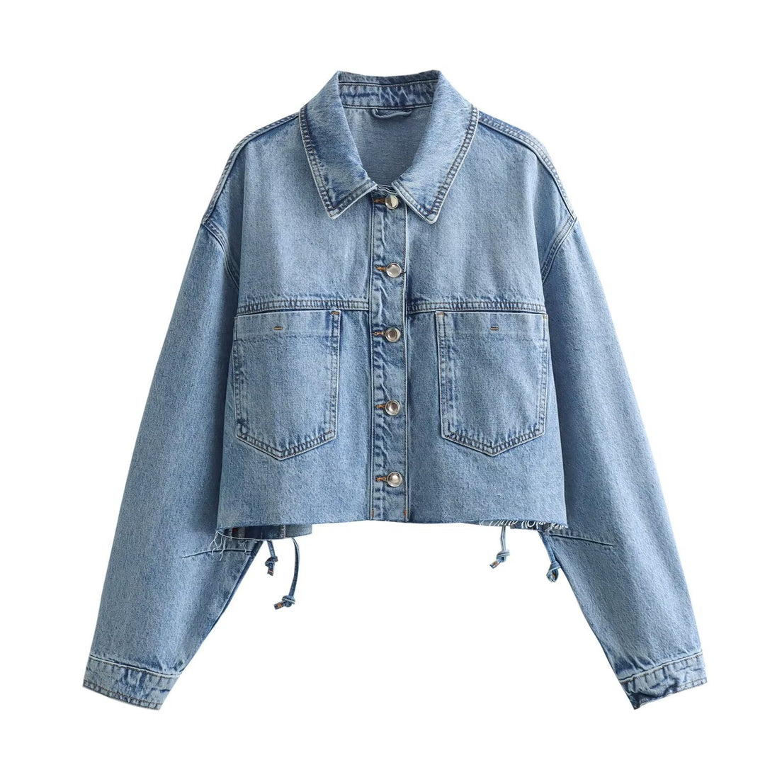 Women's cropped oversized jeans jacket with drawstring hem, patch chest pockets, and metal button placket Mune Fashion