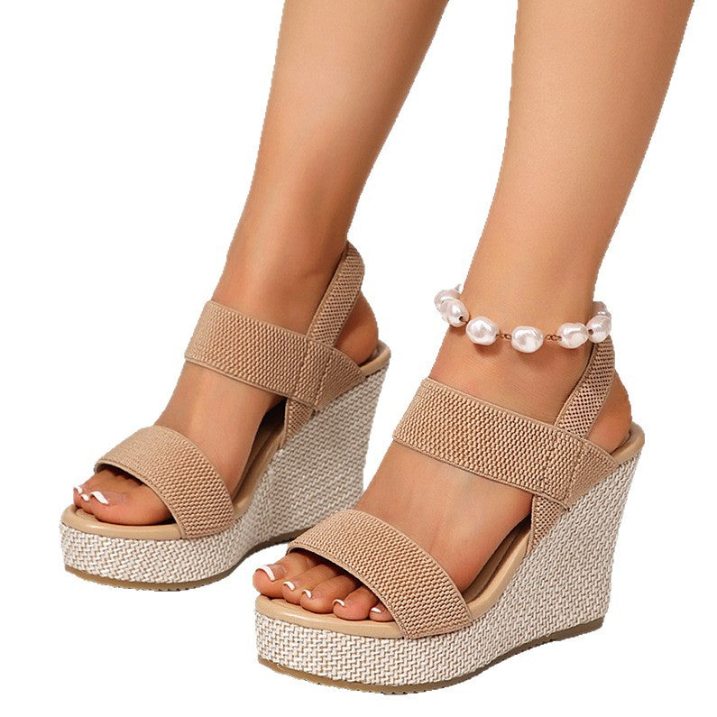 Women's wedge sandals with elastic textile straps and braided straw platform Mune Fashion