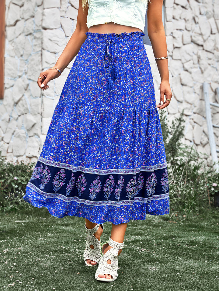 Ladies nan lightweight tiered maxi skirt with elastic ruffle waistband, cord tassel and delicate paisley print Mune Fashion