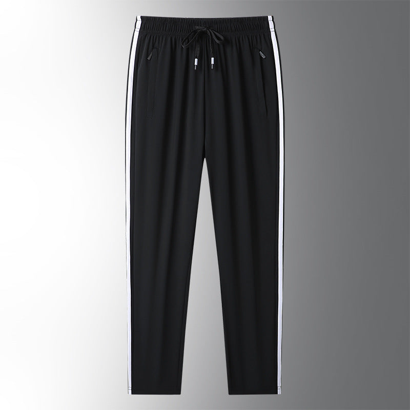 Men's sporty training pants with side zippers