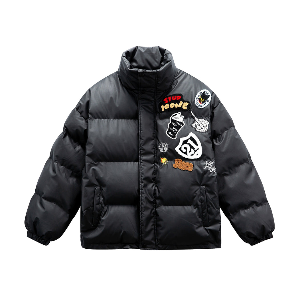 Unisex Boxy padded oversized puffer jacket with stand-up collar and statement patch details Mune Fashion