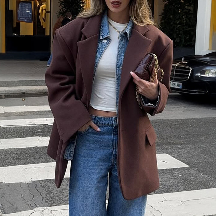 Women's oversized long blazer with boxy cut, notched lapel, padded flap pockets, and textured wool blend Mune Fashion