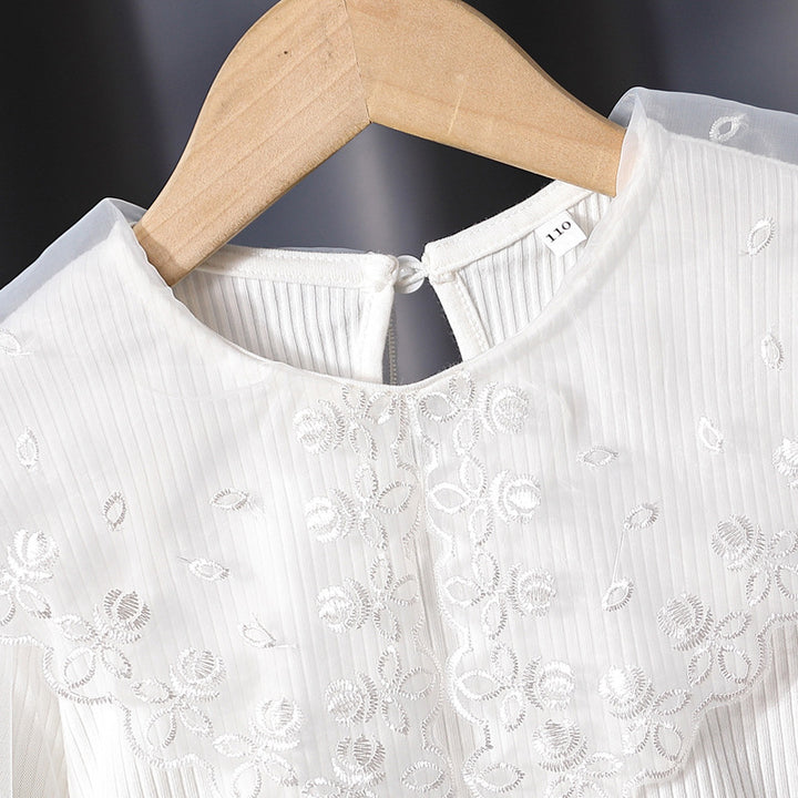 Girl's blouse with transparent puff sleeves and floral lace trim Mune Fashion