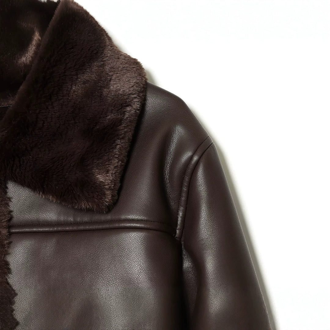 Women's short jacket in lambskin look with fur collar, patch pockets and button placket Mune Fashion