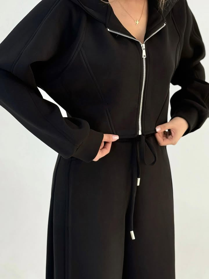Women's loose high-waist lounge pants with drawstring, side pockets, and decorative seams Mune Fashion