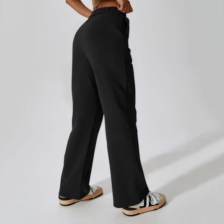 Women high-waisted flared lounge pants with elastic comfort waistband and concealed pockets Mune Fashion