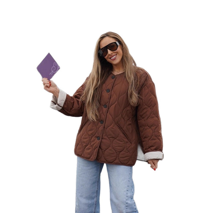 Women's quilted transitional jacket with round quilting, boxy silhouette and press stud placket Mune Fashion