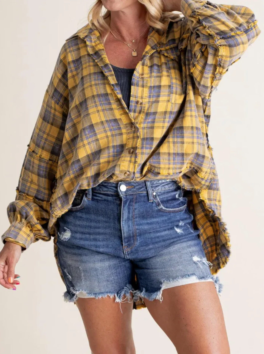 Women's oversized check shirt with fringe trim, chest pockets, and loose fit Mune Fashion