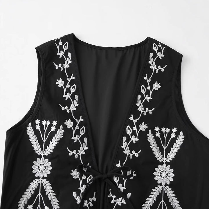 Women nan embroidered short vest in Boho style with deep V-neck, floral decorative embroidery and tie band Mune Fashion