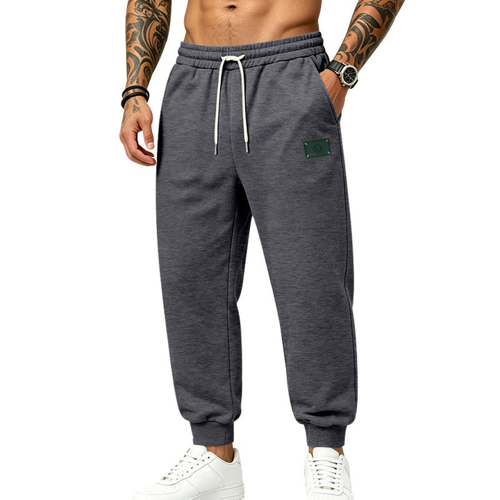 Men's casually cut sweat jogging pants with elastic waistband, drawstring, and cuffs Mune Fashion