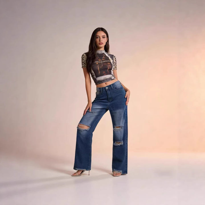 Women's high-cut relaxed jeans with wide leg, knee rips, and raw hem Mune Fashion
