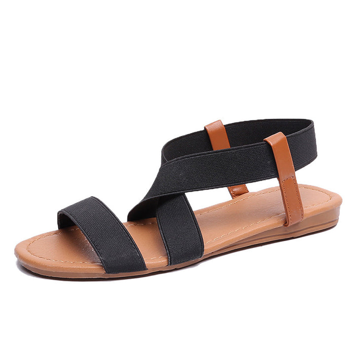 Women's flat elastic strap sandals with crossed stretch bands and padded comfort footbed Mune Fashion