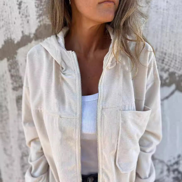 Women's fine corduroy transitional jacket with hood, zipper, elastic cuffs, and side insert pockets Mune Fashion