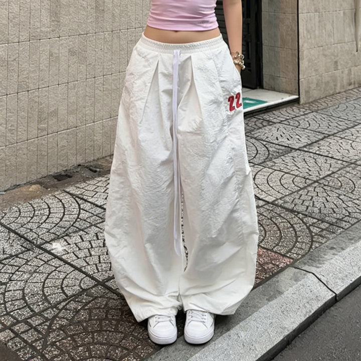 Ladies wide linen trousers with high elastic waistband, drawstring and casual palazzo cut Mune Fashion