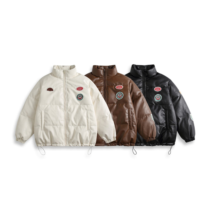 Unisex Short Cut Padded Faux Leather Puffer with High Standing Collar and Badge Details Mune Fashion