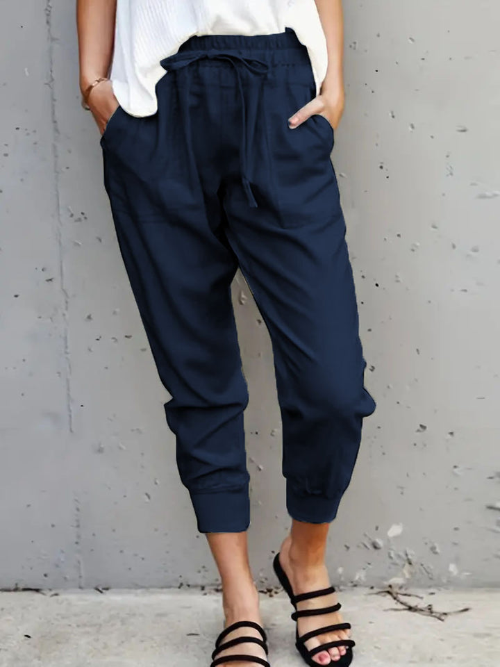 Women's jogging pants with elastic waistband, drawstring and leg cuffs Mune Fashion