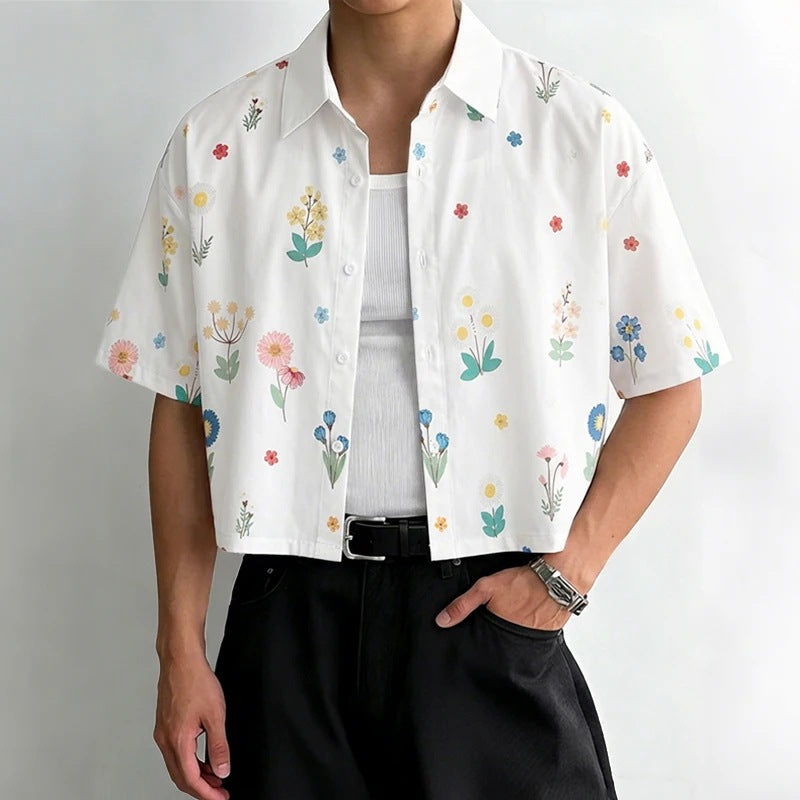 Women's loosely cut short sleeve shirt blouse with floral all-over print, shirt collar and short hem Mune Fashion