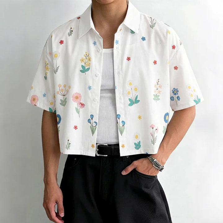 Women's loosely cut short sleeve shirt blouse with floral all-over print, shirt collar and short hem Mune Fashion