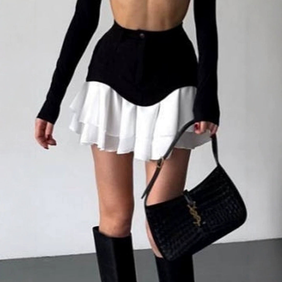Women's mini skirt with high-waisted corset band and layered ruffles