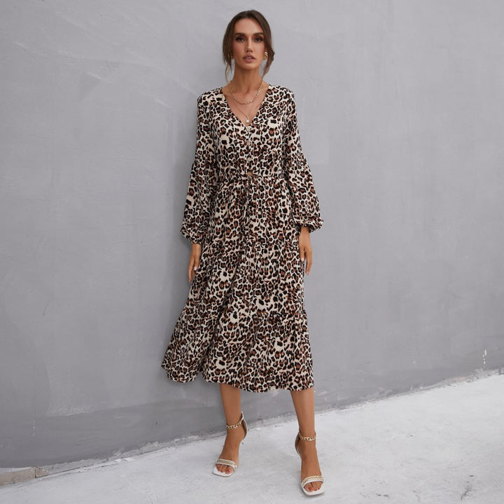 Women’s midi dress in leopard print with V-neckline, button placket, drawstring waist, and tiered skirt Mune Fashion