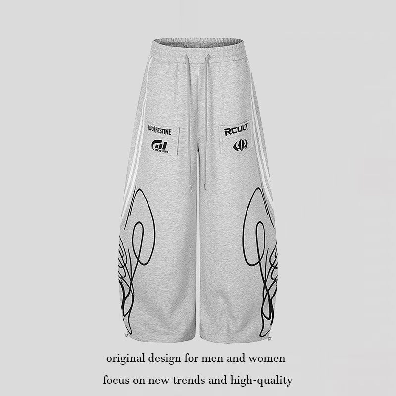 Women's Wide Midi Lounge Sweatpants in Palazzo Cut with Drawstring, Zip Hem and Statement Print Mune Fashion