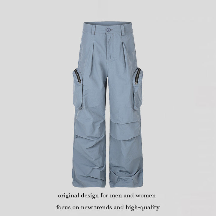 Women wide-cut cargo palazzo pants with high waist, zip pockets and layered panels Mune Fashion