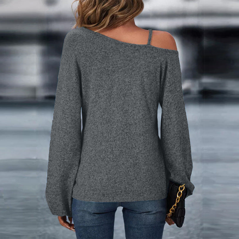 Women’s asymmetrical off-shoulder knit sweater with decorative chain strap and twisted knot front Mune Fashion