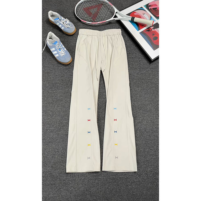 Women's sporty leisure pants with elastic waistband and colorful detail Mune Fashion